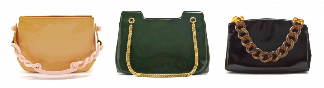 A Group of Three Roger Vivier Patent Leather Framed: A Group of Three Roger Vivier Patent Leather Framed Bags, circa 1960, comprised of an orange bag with a pink resin chain link strap, a green bag with a goldtone chain strap, and a brown bag with a fau