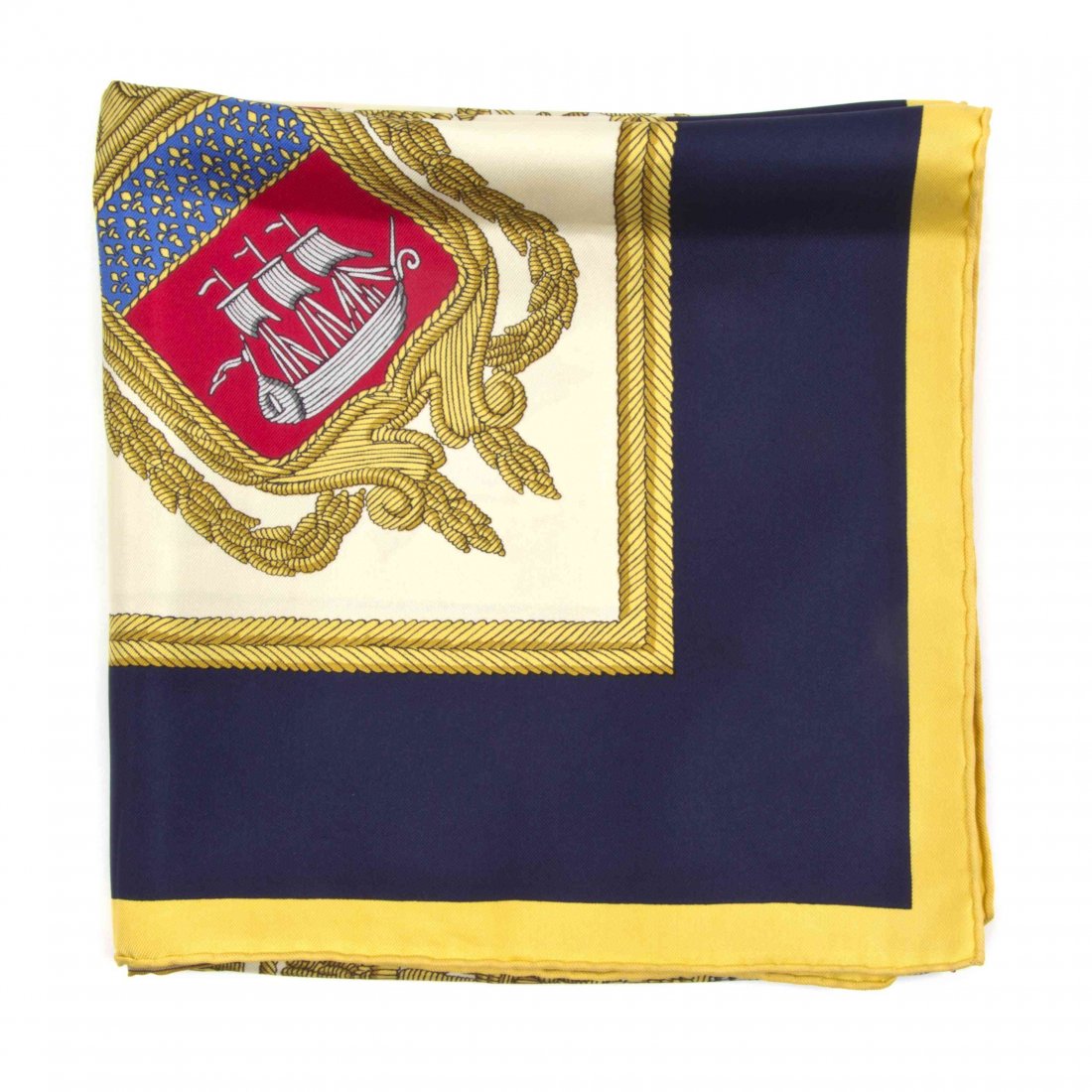 An Hermès Silk Scarf, 35 x 35 inches.: An Hermès Silk Scarf, in a 'Les Armes de Paris' motif. Labeled within print: Hermès. 35 x 35 inches. Property from the Estate of Betsy Pickering Kaiser