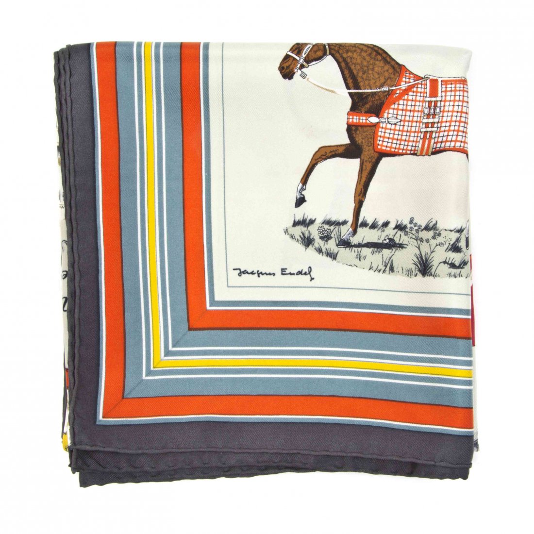 An Hermès Silk Scarf, 35 x 35 inches.: An Hermès Silk Scarf, in a 'Couvertures et Tenues de Tour Pour l'Ecurie, l'Attente, et la Presentation' motif. Labeled within print: Hermès. 35 x 35 inches. Property from the Estate of Betsy Pickeri