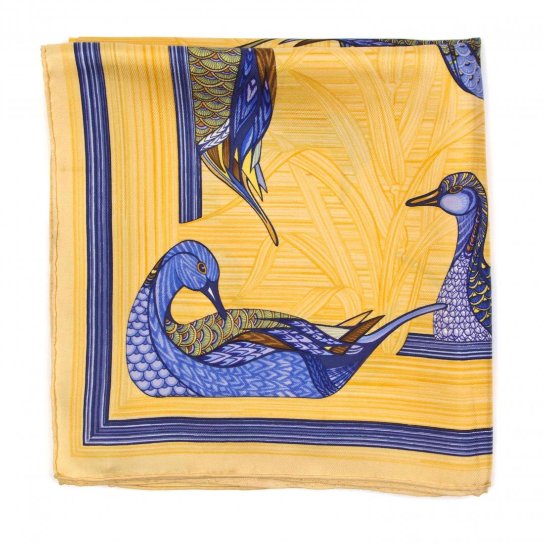 An Hermès Silk Scarf, 35 x 35 inches.: An Hermès Silk Scarf, in a duck motif. Labeled within print: Hermès. 35 x 35 inches. Property from the Estate of Betsy Pickering Kaiser