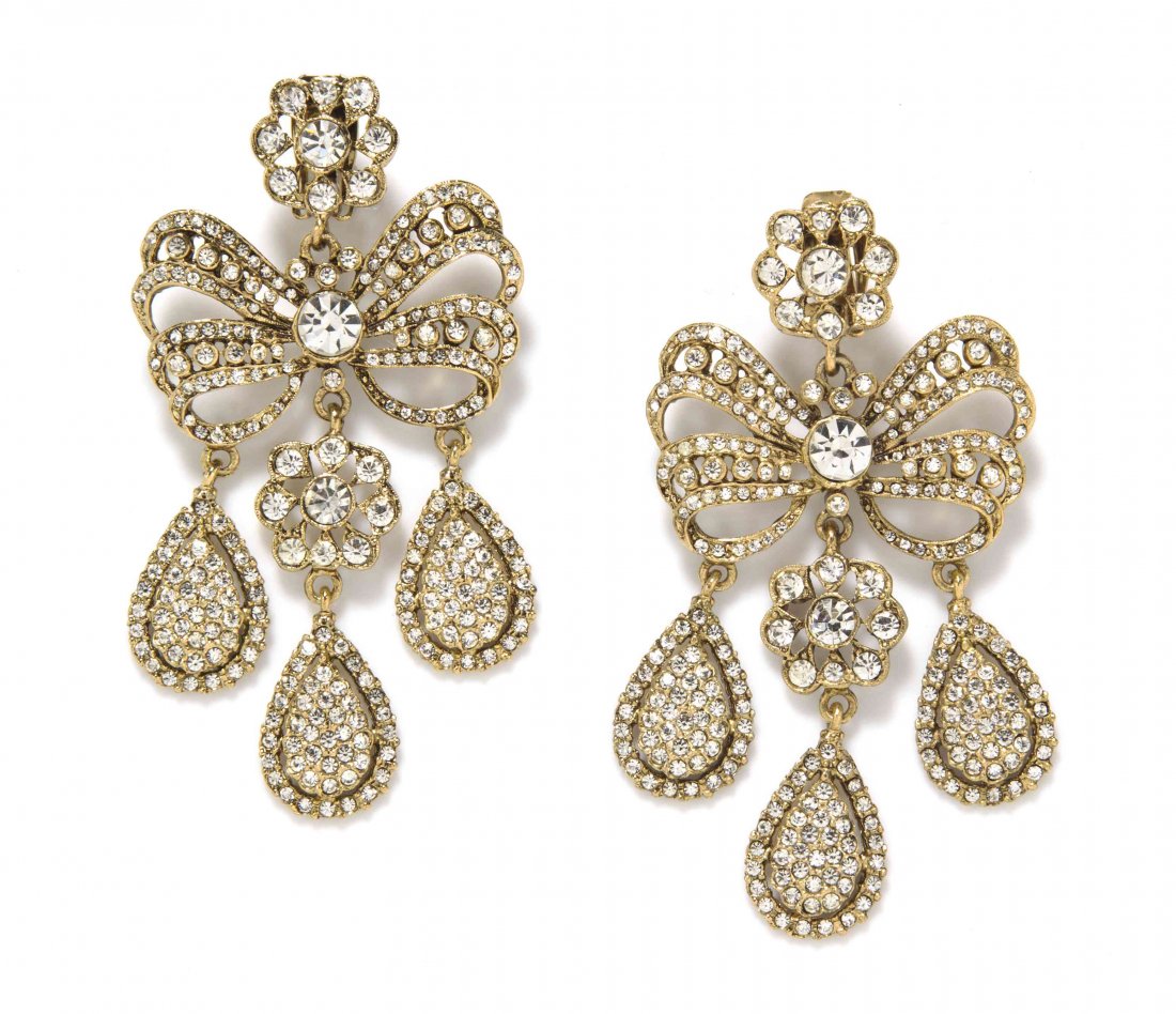 A Pair of Kenneth Jay Lane Goldtone Rhinestone Bow: A Pair of Kenneth Jay Lane Goldtone Rhinestone Bow Chandelier Earclips. Stamped: Kenneth Lane. Property from the Estate of Betsy Pickering Kaiser