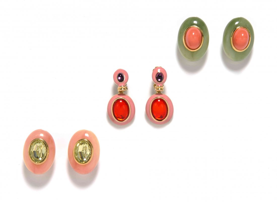 A Group of Kenneth Jay Lane Goldtone Earclips,: A Group of Kenneth Jay Lane Goldtone Earclips, comprised of a pair of green resin and faux coral cabochon earclips, a pair of peach resin and faux facted peridot earclips, and a pair of pink enamel wi