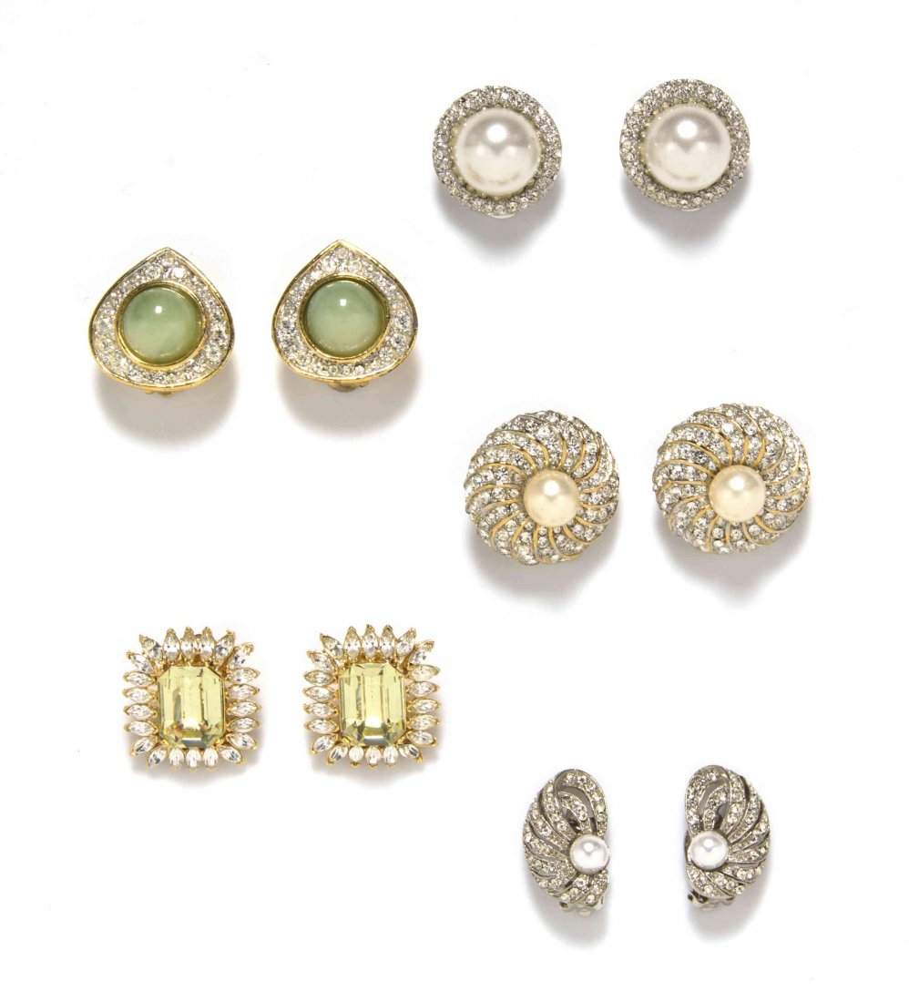 A Group of Kenneth Jay Lane Rhinestone Earclips,: A Group of Kenneth Jay Lane Rhinestone Earclips, comprised of three pairs of faux pearl earclips, a pair of faux peridot faceted earclips and a pair of green cabochon earclips. All stamped: Kenneth La