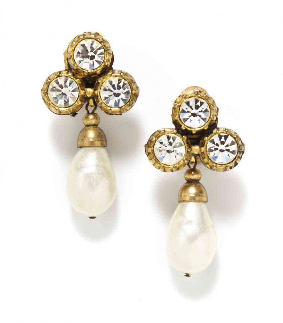A Pair of Chanel Gripoix Faux Baroque Pearl Earclips,: A Pair of Chanel Gripoix Faux Baroque Pearl Earclips, triple rhinestone cluster with a faux baroque pearl drop. Stamped: Chanel 1984. Property from the Estate of Betsy Pickering Kaiser