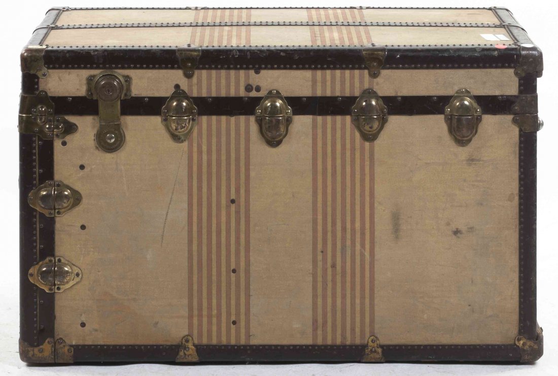 A Canvas and Gilt Metal Mounted Trunk, Height 26 x: A Canvas and Gilt Metal Mounted Trunk, of rectangular form, having nailhead trim throughout. Height 26 x width 42 x depth 22 1/2 inches.