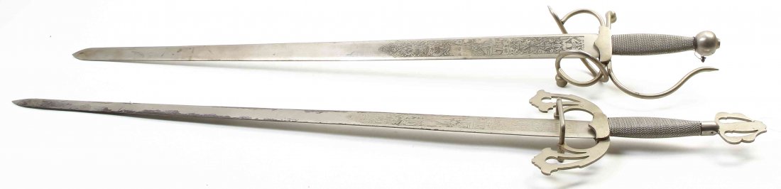 A Pair of Toledo Replica Swords, Length of longer 41: A Pair of Toledo Replica Swords, Tizona and La Colada, after the swords carried by Rodrigo Diaz de Vivar. Length of longer 41 1/2 inches.