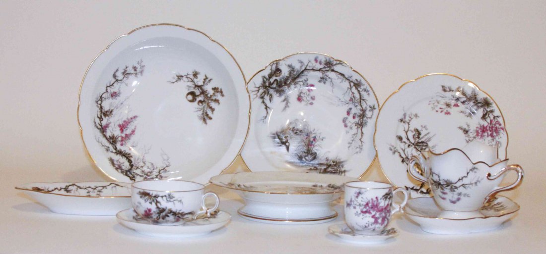 A Continental Porcelain Partial Dinner Service,: A Continental Porcelain Partial Dinner Service, comprising 15 dinner plates, 14 luncheon plates, 14 soup plates, 15 dessert bowls, 15 saucers, 13 demitasse saucers, 10 cups, 7 demitasse cups, 11 bread