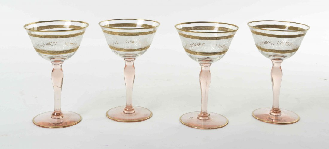 A Set of Fourteen Continental Etched Glass Champagne: A Set of Fourteen Continental Etched Glass Champagne Stems, each with repeating rose decoration, with further gilt banding to bowl and foot. Height 5 5/8 inches.
