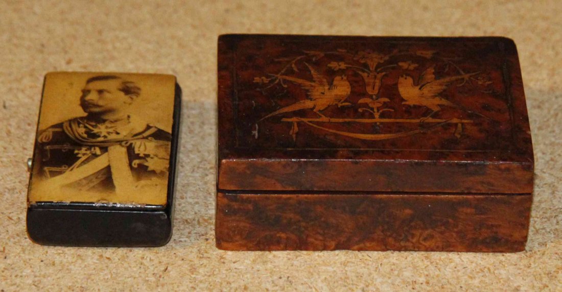 A Continental Lacquered Snuff Box, Width of larger 3: A Continental Lacquered Snuff Box, of rectangular form decorated with a picture of Kaiser Wilhelm, together with a marquetry burlwood stamp box. Width of larger 3 inches. Property from the Collection 