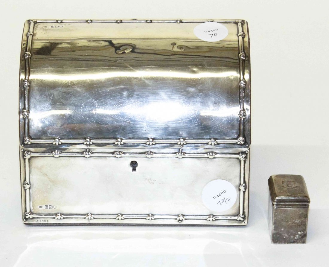 An English Silver Letter Box, London, maker W.C., Width: An English Silver Letter Box, London, maker W.C., together with an English silver stampbox. Width of widest 6 1/2 inches.