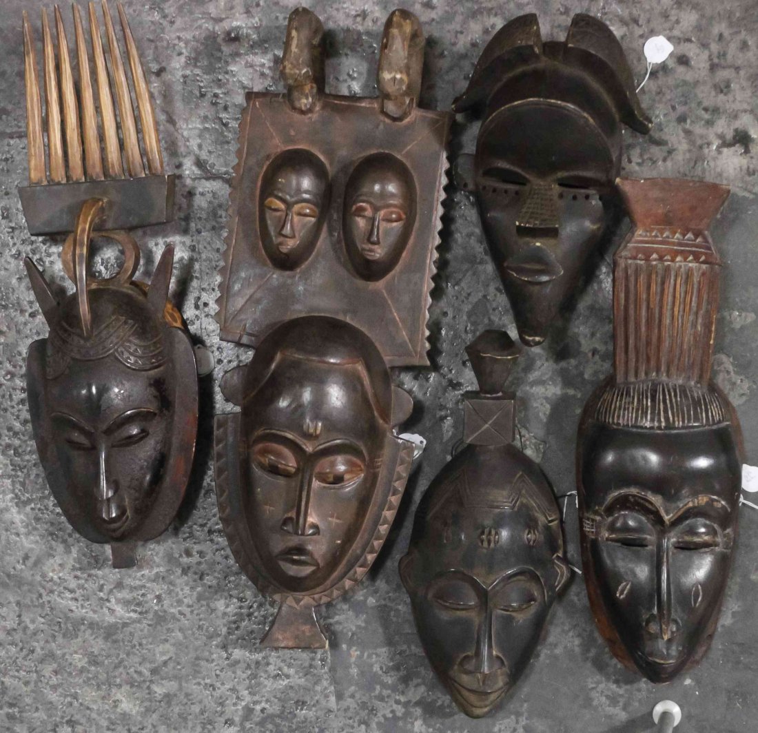 Five African Carved Masks, Height of tallest 24 1/4: Five African Carved Masks, comprising three Guro examples, a Baule example and a Bakuba example. Height of tallest 24 1/4 inches. Property from the Collection of Gerald F. Glaeve, Mount Horeb, Wiscons