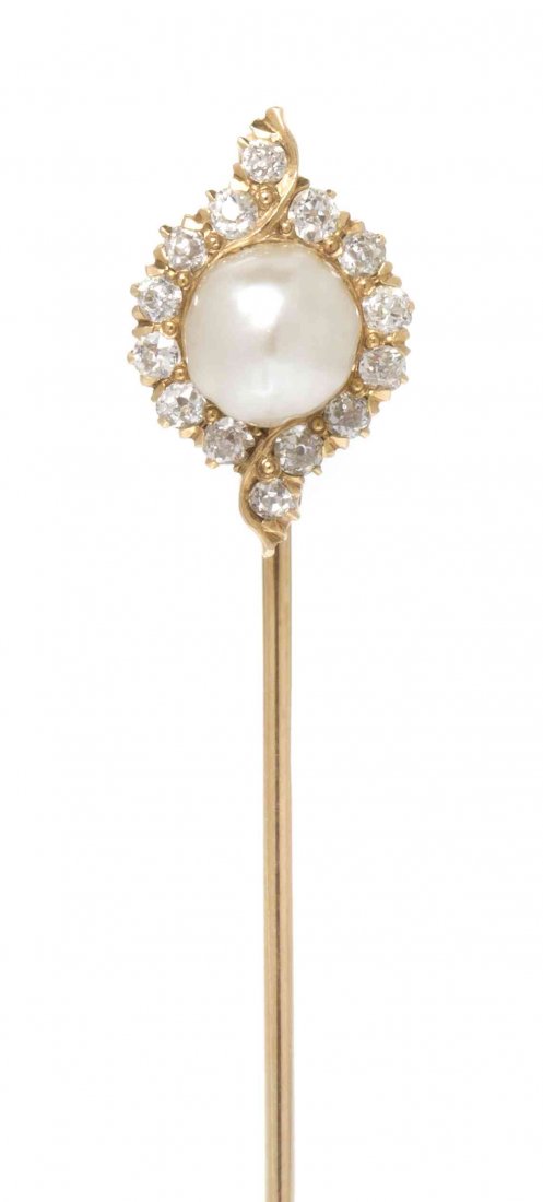 An Edwardian Yellow Gold, Pearl and Diamond Stick Pin,: An Edwardian Yellow Gold, Pearl and Diamond Stick Pin, consisting of a pearl (origin not tested) measuring approximately 7.50 mm in diameter and 14 old mine cut diamonds weighing approximately 0.50 ca