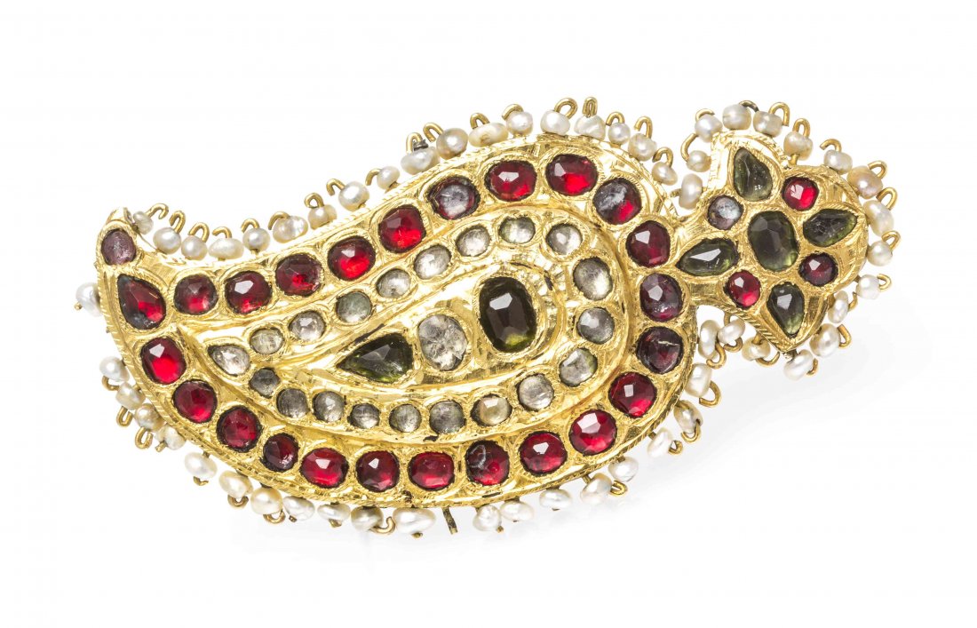 A Yellow Gold, Pearl and Foil-Backed Paste Brooch,: A Yellow Gold, Pearl and Foil-Backed Paste Brooch, in a Mughal style, containing numerous wire set pearls (origin not tested) and faceted foil-backed colorless, green and red paste. 15.90 dwts. Proper