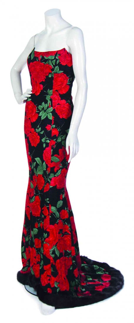 A Zang Toi Red Silk Rose Print Gown, Size 6.: A Zang Toi Red Silk Rose Print Gown, (American, b. 1961) strapless with fur piping to the train, together with a fur trim matching jacket. Labeled: Zang Toi. floral print silk with black mink trim siz