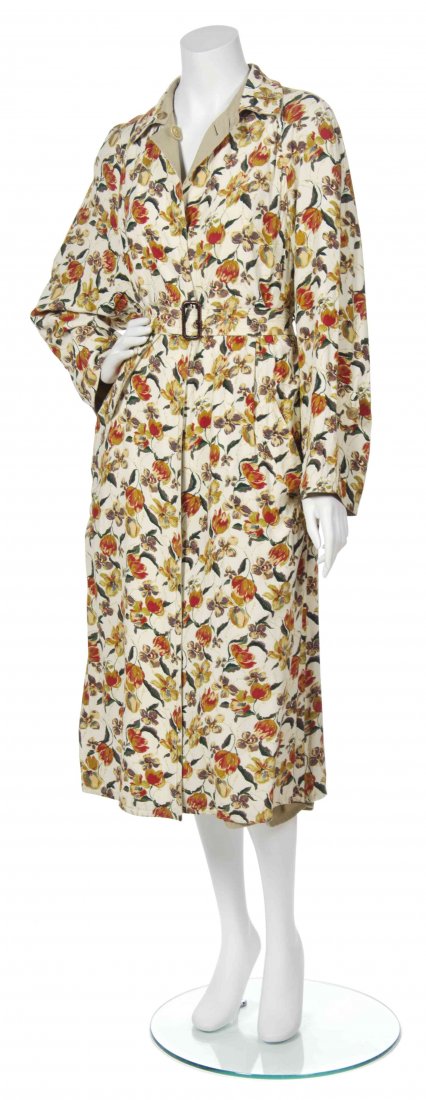 A Jean Paul Gaultier Reversible Cotton Trench Coat,: A Jean Paul Gaultier Reversible Cotton Trench Coat, Fully reversible to a solid khaki, with an accompany floral print belt. Labeled: Jean Paul Gaultier / Bergdorf Goodman.