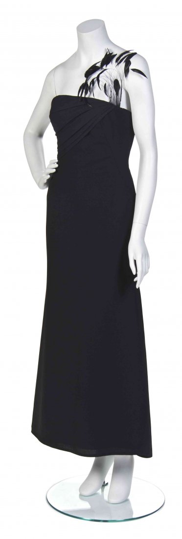 A Black Silk Crepe Dress,: A Black Silk Crepe Dress, attributed to Givenchy, strapless with a feather embellishment to the bust.