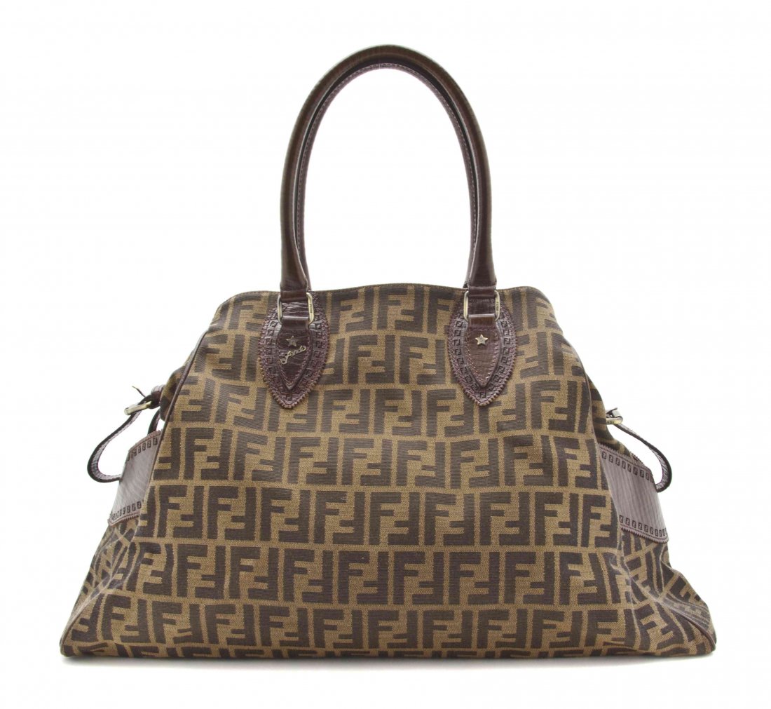 A Fendi Brown Monogram Hobo Bag, 19 x 13 x 5 1/2: A Fendi Brown Monogram Hobo Bag, two brown leather handles, hook closure, goldtone hardware, embossed leather details, with an interior zippered pocket. Stamped: Fendi. 19 x 13 x 5 1/2 inches. Propert