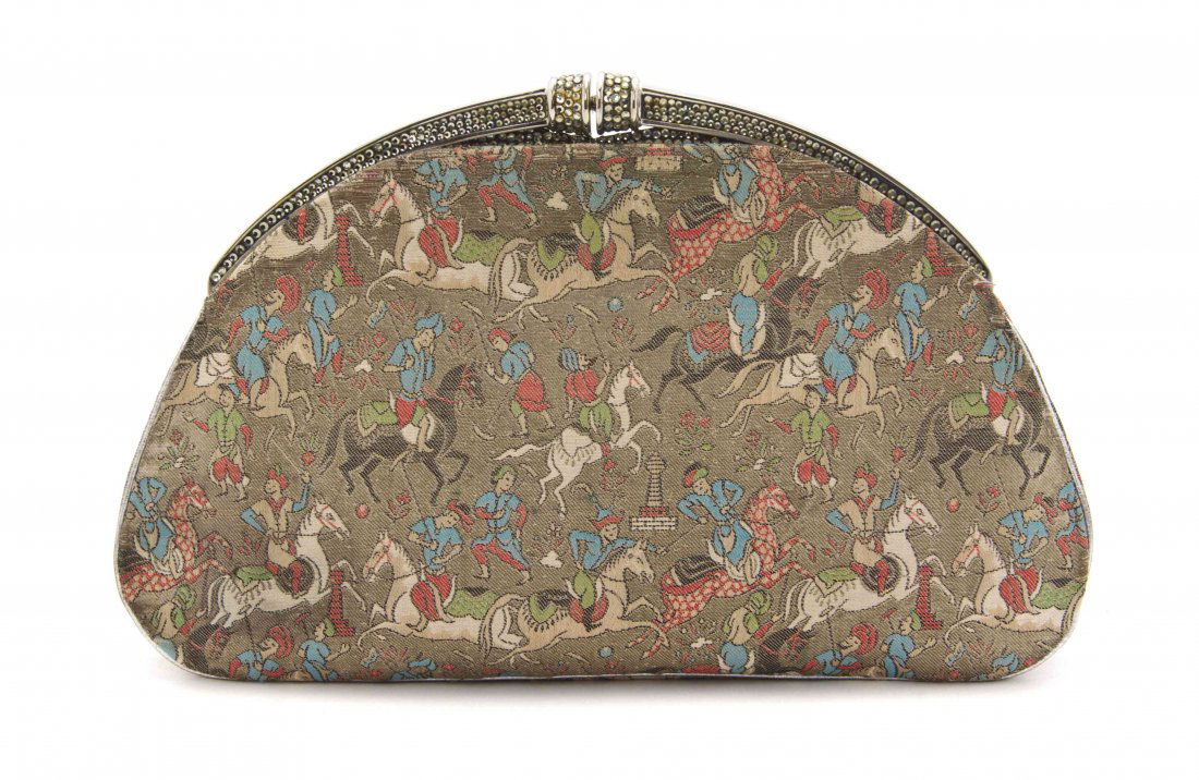 A Judith Leiber Taupe Silk Brocade and Rhinestone Frame: A Judith Leiber Taupe Silk Brocade and Rhinestone Frame Clutch, brocade body with silver piping and arched silvertone frame set with matching topaz rhinestones. Satin lining with two scalloped slip po