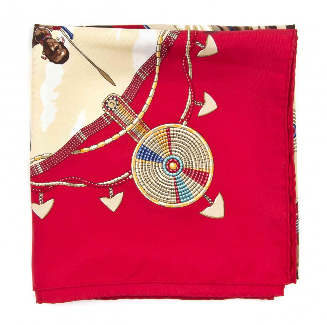 An Hermes Silk Scarf, 35 x 35 inches.: An Hermes Silk Scarf, in a 'Perles du Kenya' motif. Labeled within print: Hermes. 35 x 35 inches. Property from the Estate of Louis M. and Linda M. Byron, Tucson, Arizona
