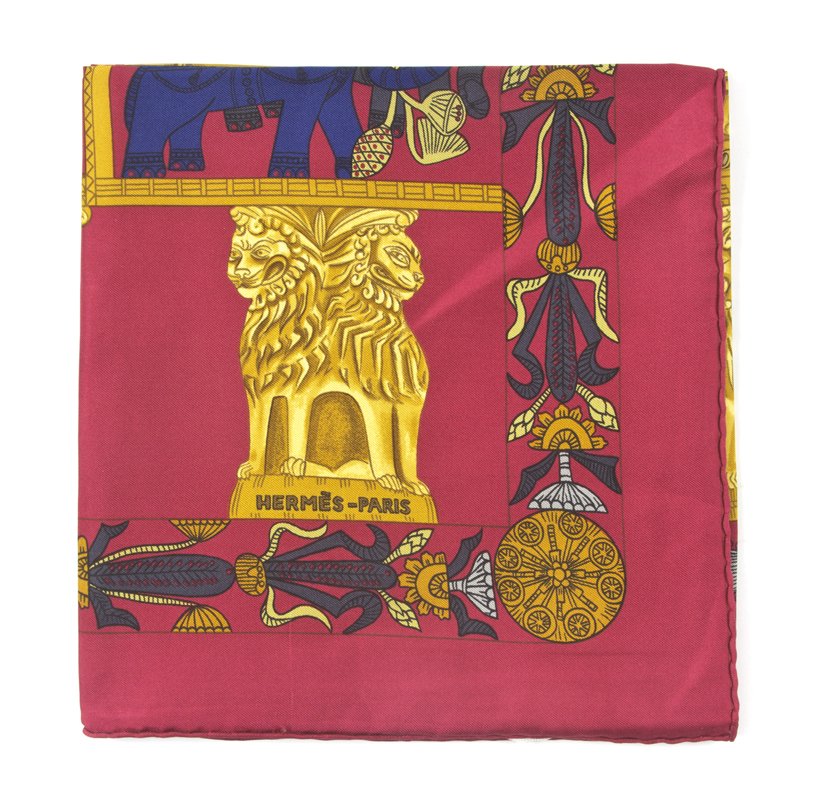 An Hermes Silk Scarf, 35 x 35 inches.: An Hermes Silk Scarf, in a 'Torana' motif. Labeled within print: Hermes. 35 x 35 inches. Property from the Estate of Louis M. and Linda M. Byron, Tucson, Arizona