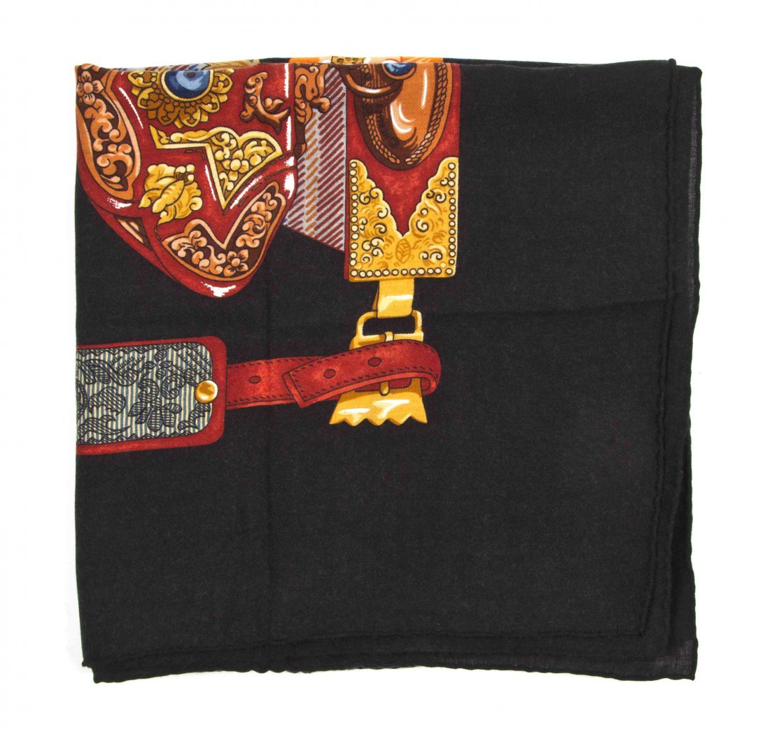 An Hermes Cashmere Silk Scarf, 52 x 52 inches.: An Hermes Cashmere Silk Scarf, in a 'Tibet' motif. Labeled within print: Hermes. 52 x 52 inches. Property from the Estate of Louis M. and Linda M. Byron, Tucson, Arizona