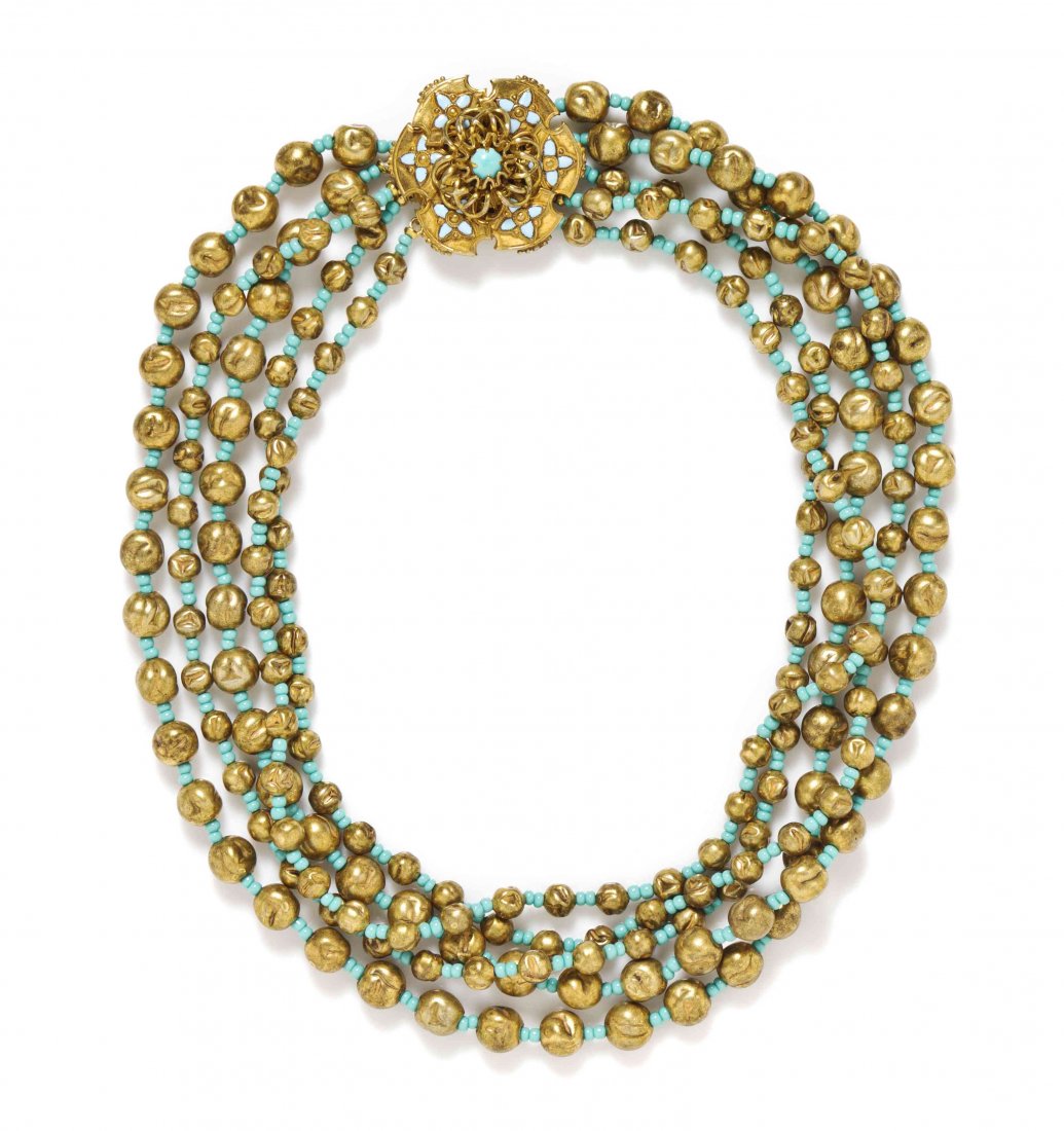 A Miriam Haskell Blue Enamel Goldtone Necklace,: A Miriam Haskell Blue Enamel Goldtone Necklace, five strands of alternating blue enamel and goldtone baroque beads and a center blue enamel and goldtone pendant. Stamped: Miriam Haskell.