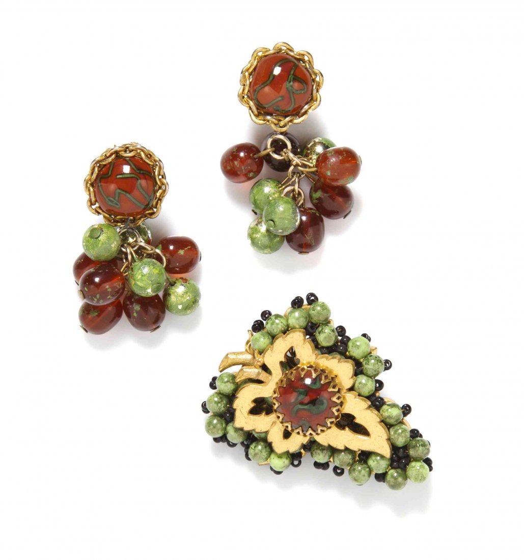 A Miriam Haskell Brown and Green Glass Bead Set,: A Miriam Haskell Brown and Green Glass Bead Set, comprised of a brooch and ear pendants with the brooch in a foliate motif and the earclips in a cluster pendant style. All stamped: Miriam Haskell. Pro