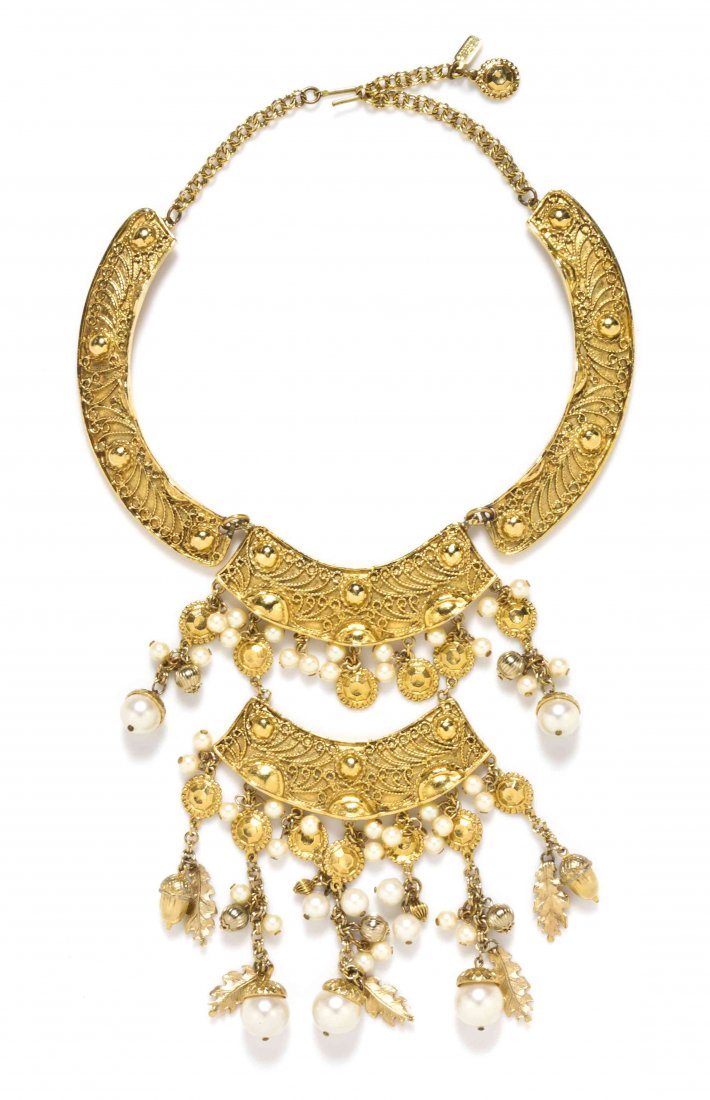 A Kenneth Jay Lane Faux Pearl Goldtone Bib Necklace,: A Kenneth Jay Lane Faux Pearl Goldtone Bib Necklace, acorn, leaf, and cylinder charms with faux pearl drops. Stamped: Kenneth Lane.