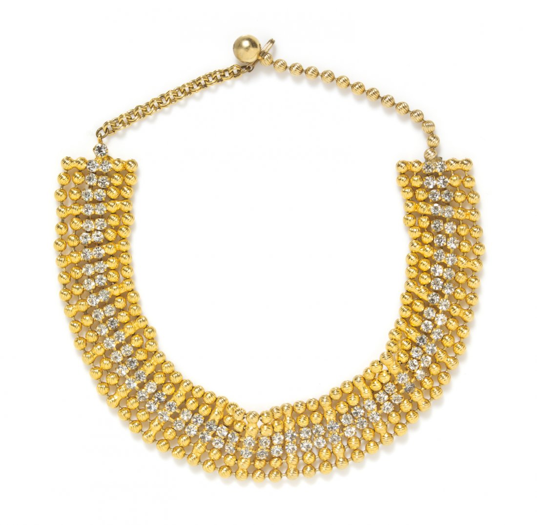 A Kenneth Jay Lane Rhinestone Ball Chain Choker,: A Kenneth Jay Lane Rhinestone Ball Chain Choker, double row of rhinestones cushioned between a double row of textured goldtone ball chains. Stamped: KJL.