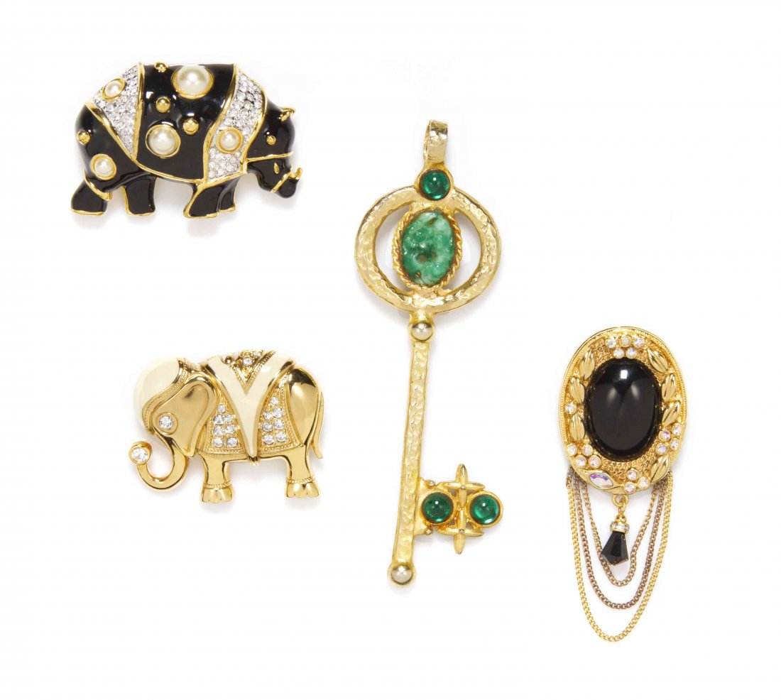 A Group of Four Kenneth Jay Lane Brooches,: A Group of Four Kenneth Jay Lane Brooches, comprised of a black enamel, rhinestone and pearl rhinoceros stamped KJL, a cream enamel and rhinestone elephant stamped KJL for Avon, a green cabochon and c