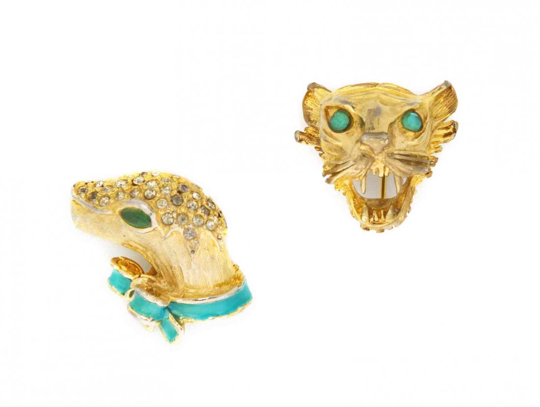 A Pair of Two Kenneth Jay Lane Brooches,: A Pair of Two Kenneth Jay Lane Brooches, comprised of one snake's head and one lion's head. Both stamped: K.J.L. Property from an Important Collector, Chicago, Illinois