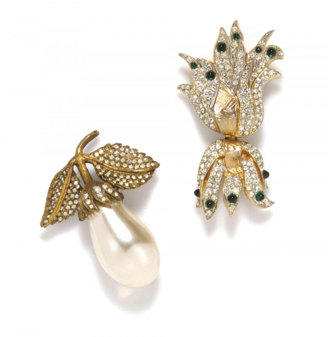 A Pair of Two Kenneth Jay Lane Brooches,: A Pair of Two Kenneth Jay Lane Brooches, comprised of a faux pearl pear stamped K.J.L. and a rhinestone and green cabochon flower stamped KJL. Property from an Important Collector, Chicago, Illinois