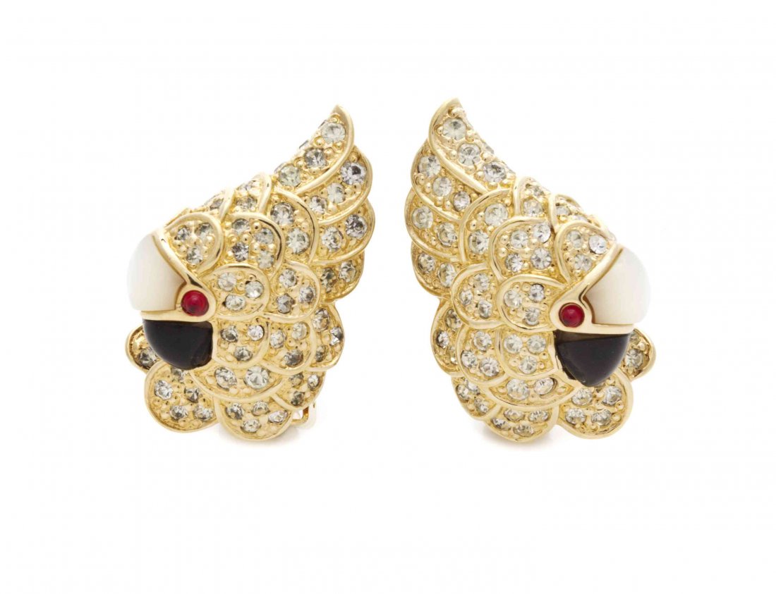 A Pair of Judith Leiber Goldtone Parrot Earclips,: A Pair of Judith Leiber Goldtone Parrot Earclips, with faux garnet eyes, black resin beak, mother of pearl and rhinestones accents. Stamped: Judith Leiber. Property from the Estate of Louis M. and Lin