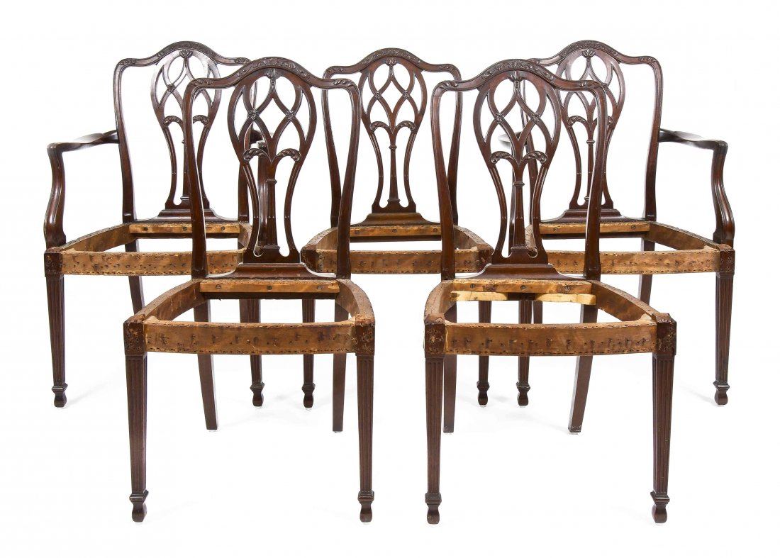 A Set of Eight Mahogany Hepplewhite Style Dining: A Set of Eight Mahogany Hepplewhite Style Dining Chairs, comprising two arm chairs and six side chairs, each with camelback cresting over pierced balloon form splat, raised on square tapering and flut