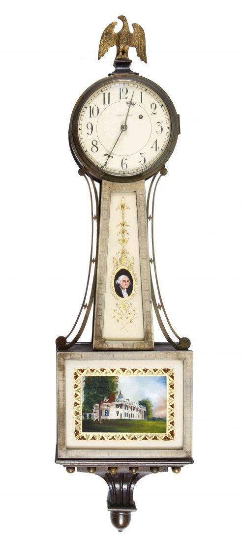 A Mahogany and Verre Eglomise Banjo Clock, Waltham,: A Mahogany and Verre Eglomise Banjo Clock, Waltham, 20th century, of typical form with single tram movement having a gilt metal eagle finial, over the case with a roundel of George Washington above th