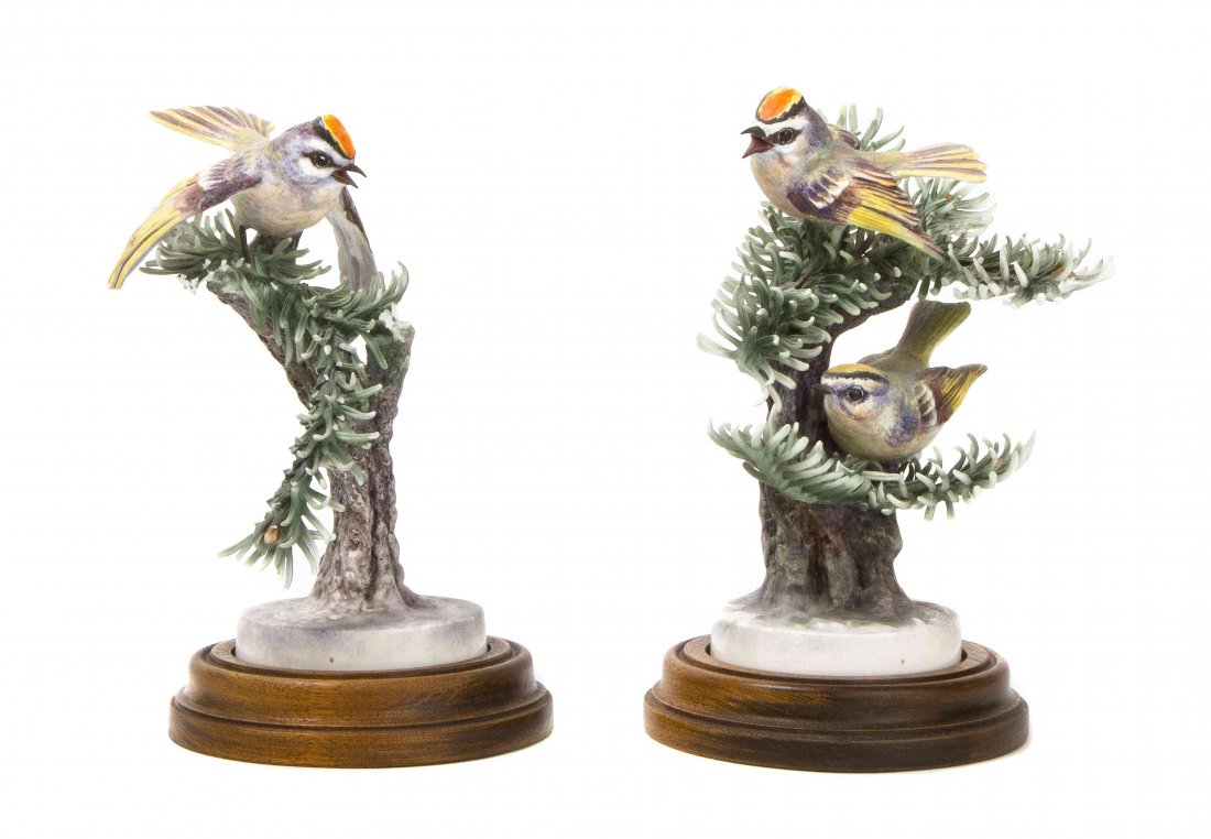 A Pair of Royal Worcester Dorothy Doughty Birds, Gold: A Pair of Royal Worcester Dorothy Doughty Birds, Gold Crown Kinglets, perched on noble pine branches. Height 7 3/4 inches. Property from the Estate of Barbara Archer Thomas, Naples, Florida