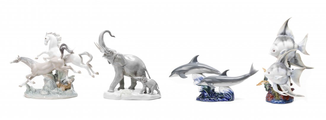 A Collection of Four Lladro Porcelain Figures, Height: A Collection of Four Lladro Porcelain Figures, comprising Horses Galloping, Two Elephants, Dance of the Dolphins, and Underwater Explorer. Height of tallest 14 3/4 inche