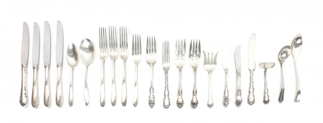 A Group of American Silver Flatware Articles, 20th: A Group of American Silver Flatware Articles, 20th Century, various makers and patterns, comprising 4 dinner knives 3 dinner forks 1 lunch knife 1 lunch fork 2 butter spreaders 3 fish forks 1 teaspoon