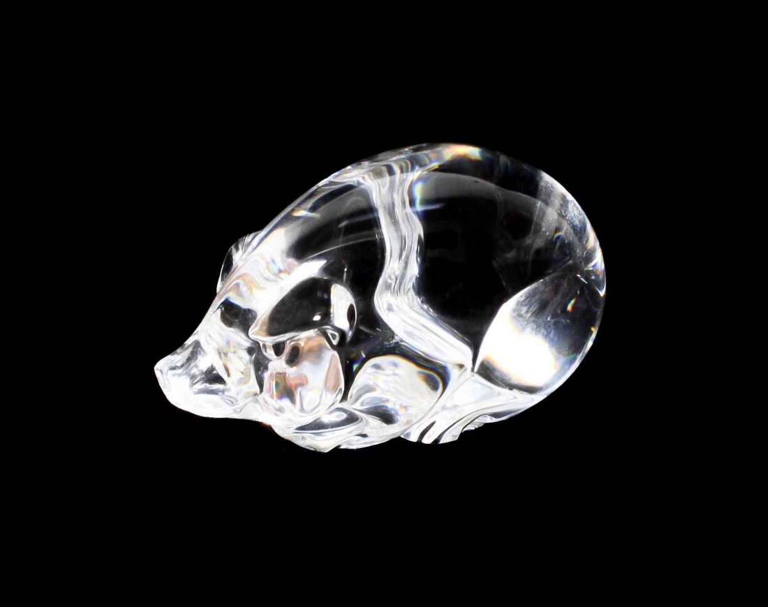 A Steuben Glass Pig, Height 2 x width 3 1/4 inches.: A Steuben Glass Pig, together with a glass teddy bear and a chick. Height 2 x width 3 1/4 inches.