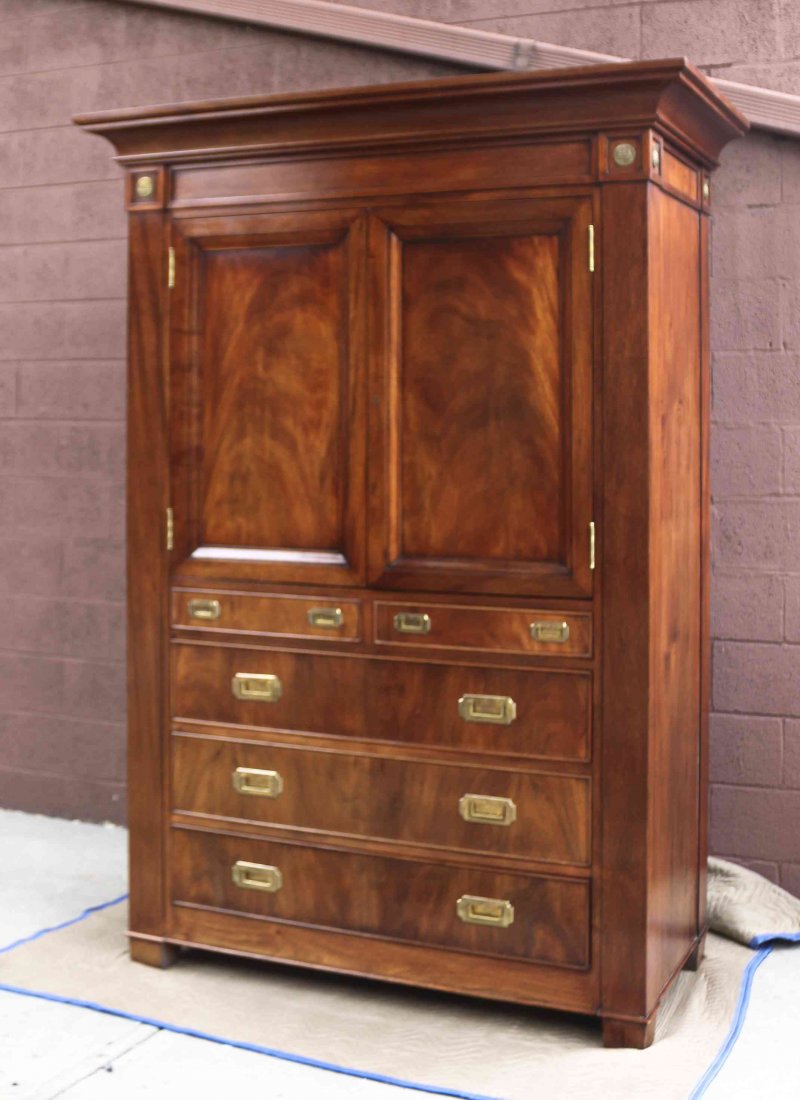 A Mahogany Cabinet on Chest, Ralph Lauren, Height 84 x: A Mahogany Cabinet on Chest, Ralph Lauren, having a shaped cornice above two cabinet doors with a fitted interior shelf, containing drawers, letter slots and clock, above two short and three long draw