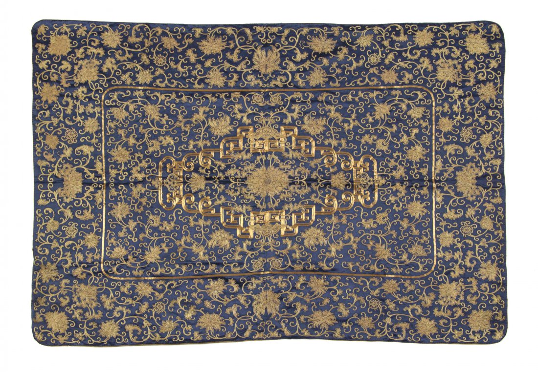 A Chinese Embroidered Silk Panel, Height 54 x width 37: A Chinese Embroidered Silk Panel, of rounded rectangular form, having scrolling lotus vines and bats in gold colored threads on a navy blue silk ground, centered with a cartouche-form reserve and inte