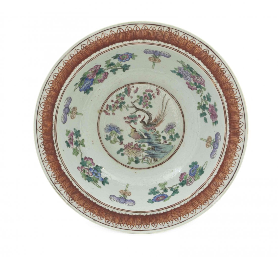 A Chinese Famille Rose Porcelain Basin, Diameter 15 7/8: A Chinese Famille Rose Porcelain Basin, of circular form centered with a roundel depicting pheasants in a rockery, with peonies, bats and coins to the cavetto. Diameter 15 7/8 inches.