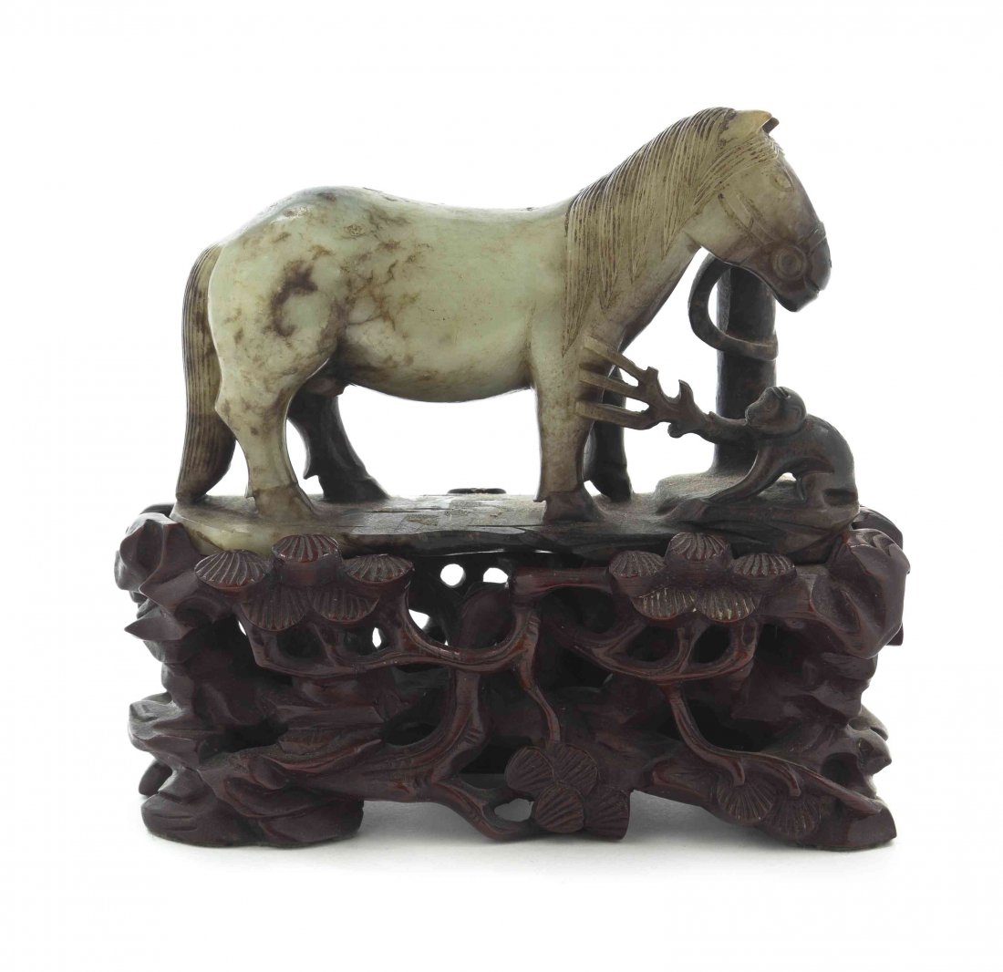 A Black and White Jade Animalier Carving, Width 4 3/4: A Black and White Jade Animalier Carving, depicting a horse and a monkey. Width 4 3/4 inches. Property from the Estate of Benjamin and Louise Pritz, Cincinnati, Ohio