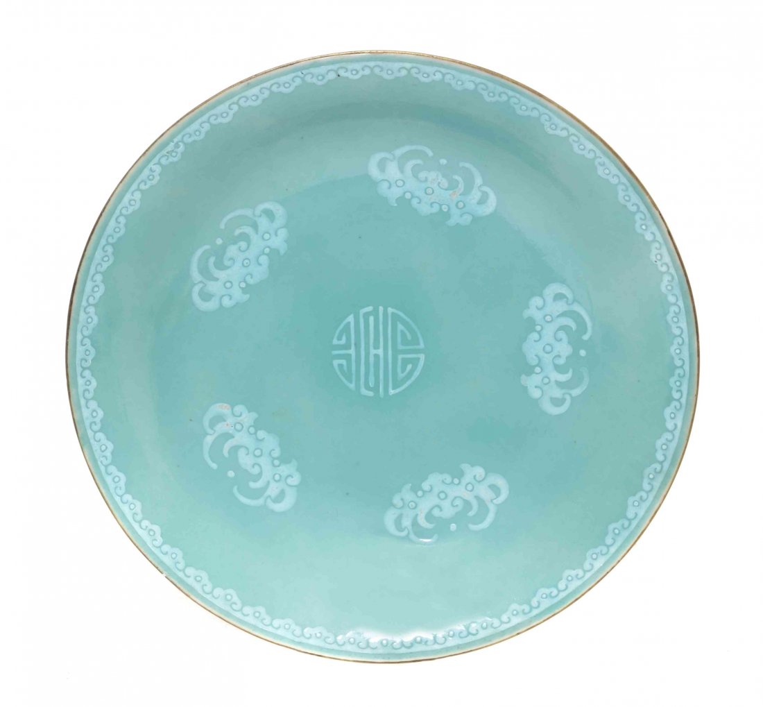 A Chinese Aqua Glazed Porcelain 'Five Bat' Dish,: A Chinese Aqua Glazed Porcelain 'Five Bat' Dish, Qing Dynasty, having a central double happiness character surrounded by five raised bats, the interior border comprised of repetitive lappets all atop 