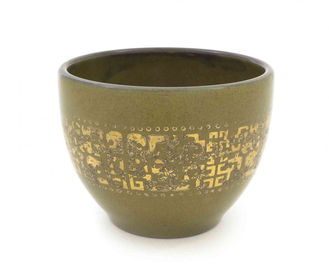 A Chinese Olive Green Ceramic Pot, Diameter 6 1/8: A Chinese Olive Green Ceramic Pot, of circular form having a slightly recessed foot, with gilt painted archaistic decoration around the center, with Yongzheng mark. Diameter 6 1/8 inches.