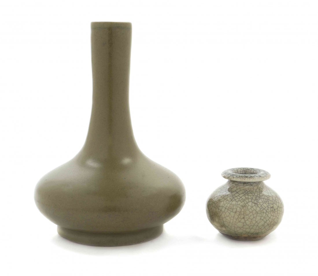A Ceramic Bottle Vase, Height of taller 6 3/4 inches.: A Ceramic Bottle Vase, having a tea dust glaze, together with a small jar with crackled glaze. Height of taller 6 3/4 inches. Property from the Collection of Richard A. Lauderbaugh, Washington, D.C