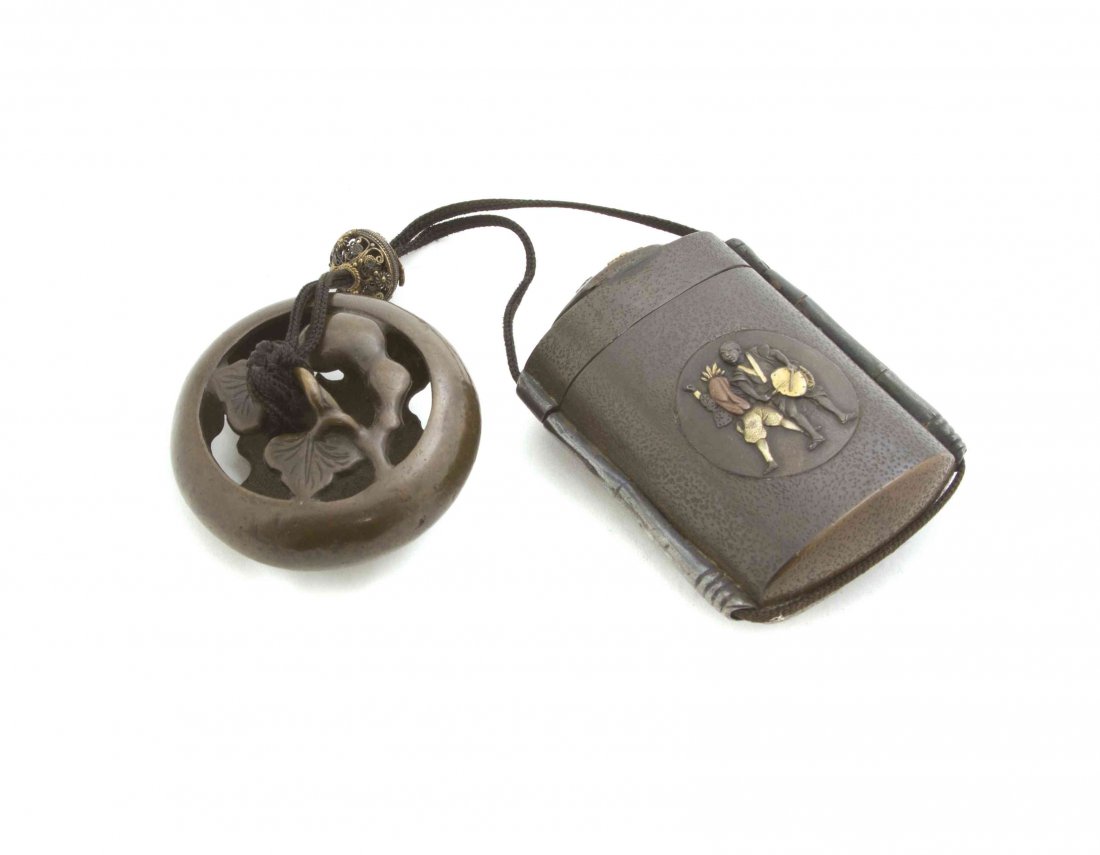 A Mixed Metal Inro, Height of inro 2 1/2 inches.: A Mixed Metal Inro, of cartouche form with gilt accented figural reserve, with a pierced metal ojime and metal manju netsuke. Height of inro 2 1/2 inches. Property from the Collection of Dr. J. Don Ne