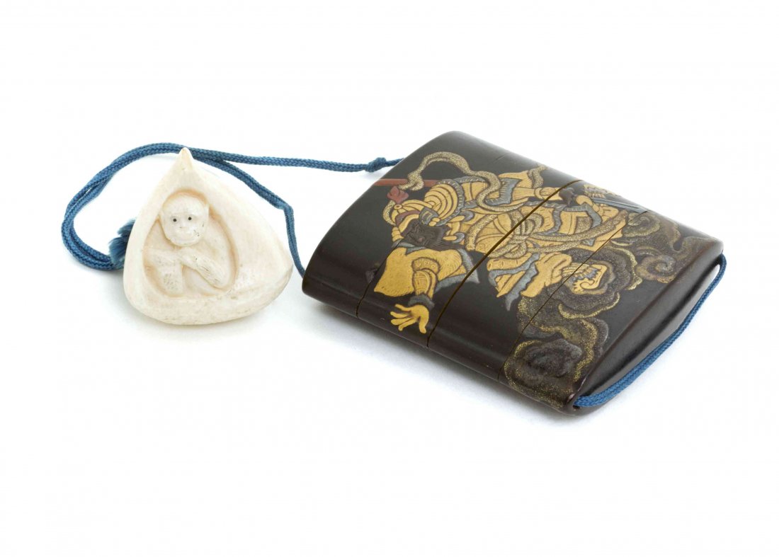 A Lacquered Inro, Height of inro 2 1/2 inches.: A Lacquered Inro, depicting a guardian chasing an oni, with an ivory netsuke of a monkey in an acorn. Height of inro 2 1/2 inches. Property from the Collection of Dr. J. Don Nelson, Fargo, North Dakot