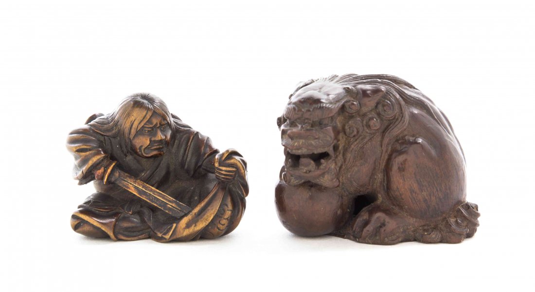 Two Carved Wood Netsuke, Width of wider 1 1/2 inches.: Two Carved Wood Netsuke, one depicting a figure with sword, the other a shishi lion. Width of wider 1 1/2 inches. Property of a Gentleman, Wisconsin Property of a Midwest Collector