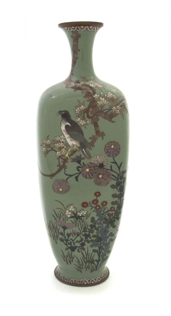 A Japanese Cloisonne Enamel Baluster Vase, Height 7 3/8: A Japanese Cloisonne Enamel Baluster Vase, depicting an eagle perched on a flowering branch above chrysanthemums and other flowering plants, on a robin's egg blue ground, having repeating petal border